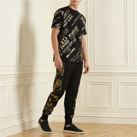 farfetch versace pants.